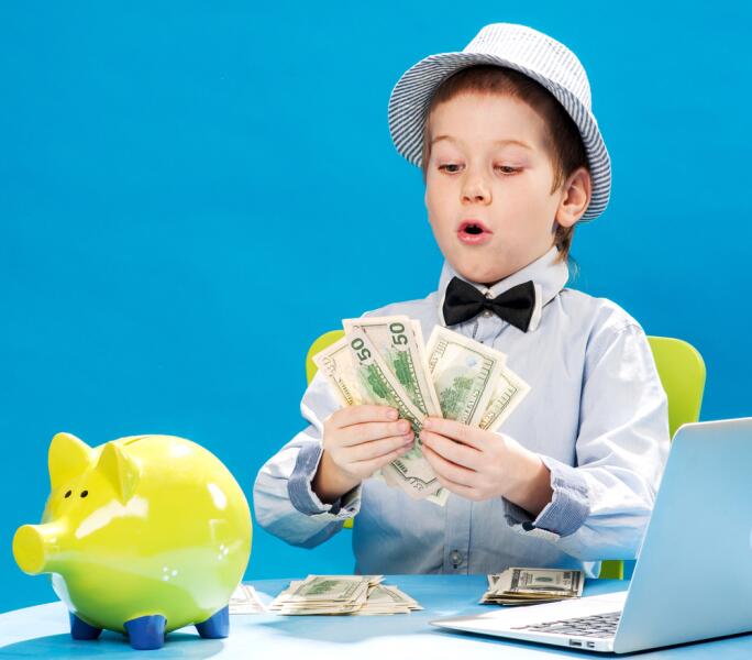 Как научить ребёнка обращаться с деньгами?